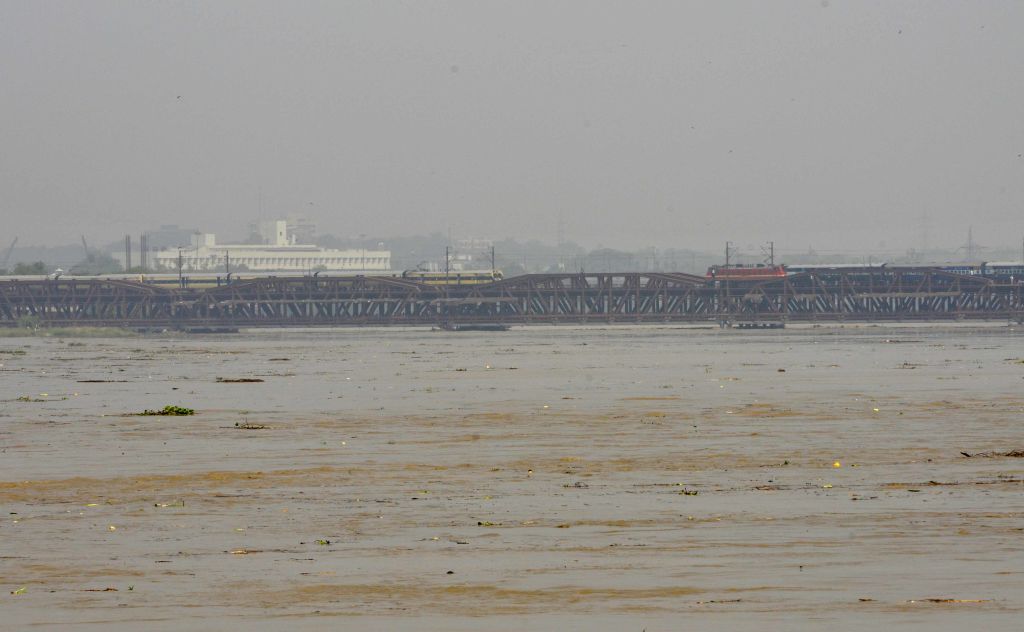 Yamuna river continues to flow above danger mark, train movement suspended on old bridge