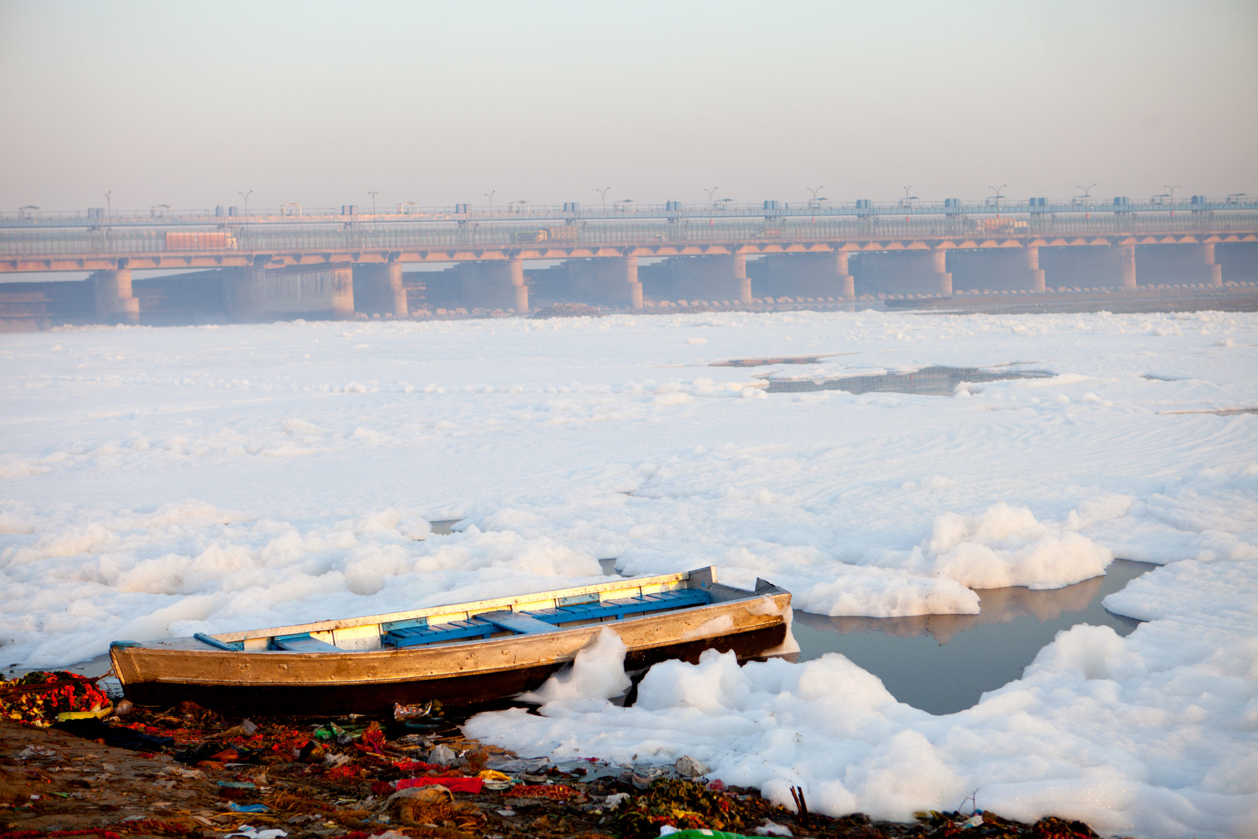 Delhi govt installs bamboo nets, sprinkles water to remove froth from Yamuna