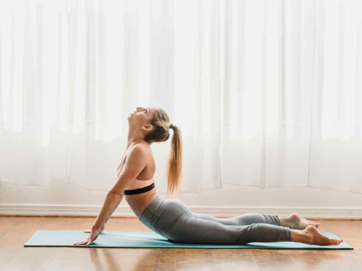 Cobra Pose (Bhujangasana) - Stimulates the abdominal organs, improves digestion, and helps regulate metabolism.