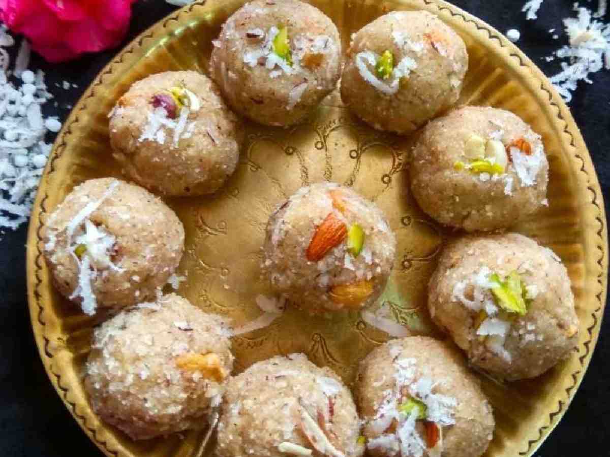 Sabudana Ladoo is a delightful sweet treat that's easy to make and perfect for festivals. Heat ghee in a pan and add the ground sabudana, roasting until it turns golden brown. Add sugar and cardamom powder, mixing well. Then, add chopped almonds and cashews. Form the mixture into small ladoos while it is still warm. Let them cool and enjoy this sweet treat