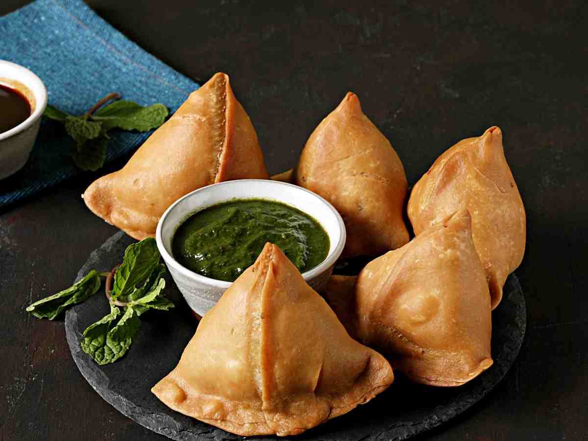 Samosas: Deep-fried pastries stuffed with spicy potato filling, ideal with hot tea