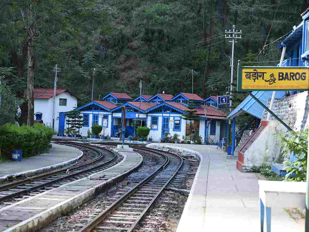 Barog Station nestled in Himachal Pradesh's hills,  is known for its haunted tunnels. Legend has it that Colonel Barog, its architect, committed suicide during construction. People claim to see his ghost near the tunnel