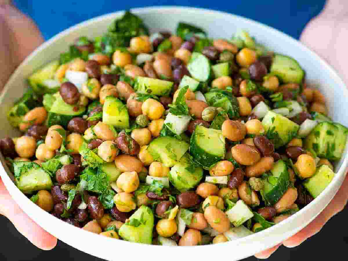 Bean Salad: A mix of chickpeas, black beans, and corn with a tangy dressing