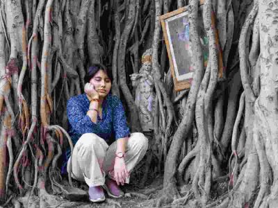 FINDING PEACE: Aahee Sapru, now residing in New Delhi, meditating near a peepal tree