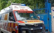 EMERGENCY: An ambulance exiting the premises of Asha Kiran