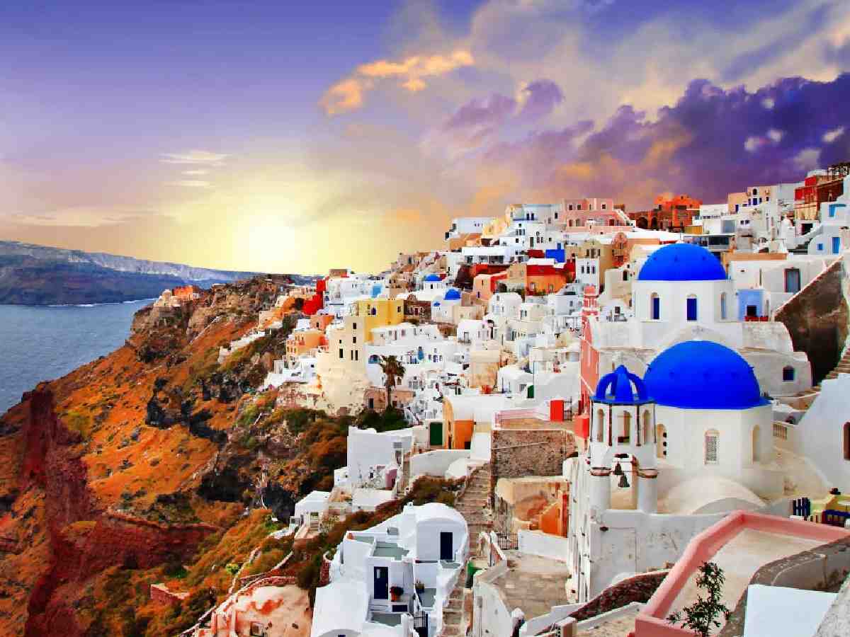 Santorini, Greece - Perfect for relaxing on beaches, exploring ancient ruins, and enjoying sunsets.