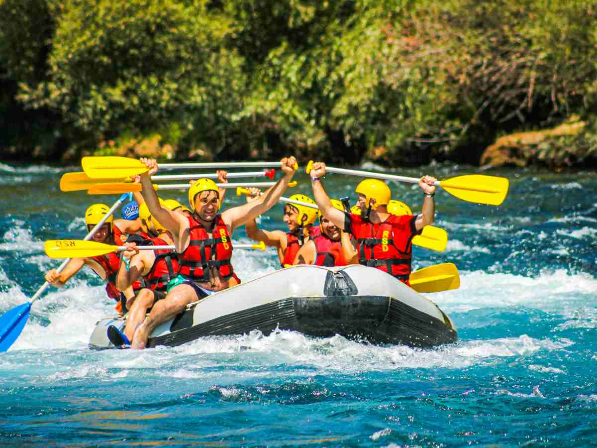 White-Water Rafting: Navigating turbulent river rapids in an inflatable raft. This sport combines teamwork with a thrilling ride through rough waters.