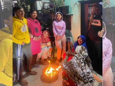 Residents huddled around a bonfire atNehru Camp