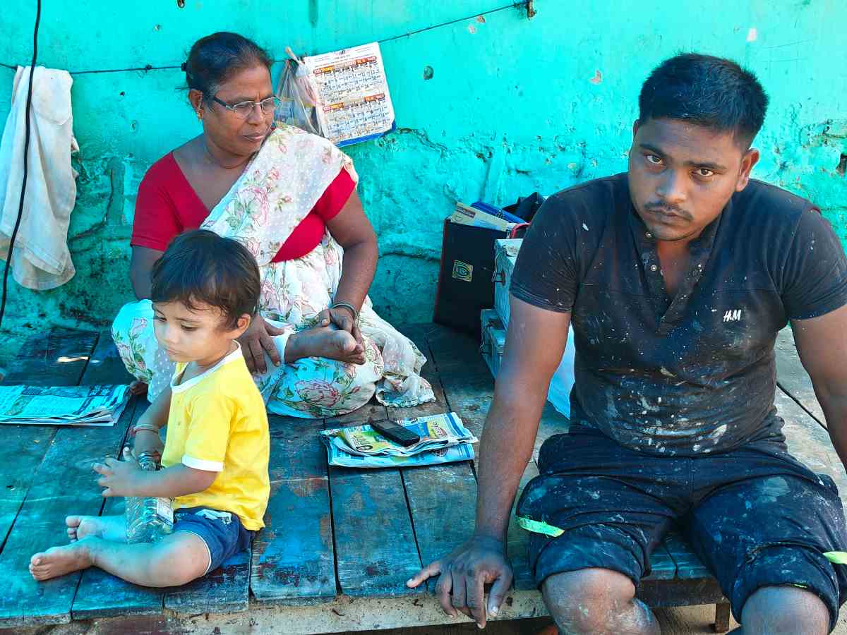 Kamlesh, sat on a cot in the camp, watching her grandchildren play in the dust
