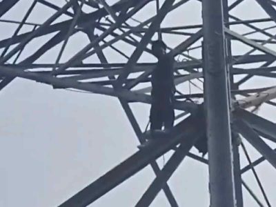 Rickshaw puller climbs high-tension pole in north Delhi over family dispute, rescued