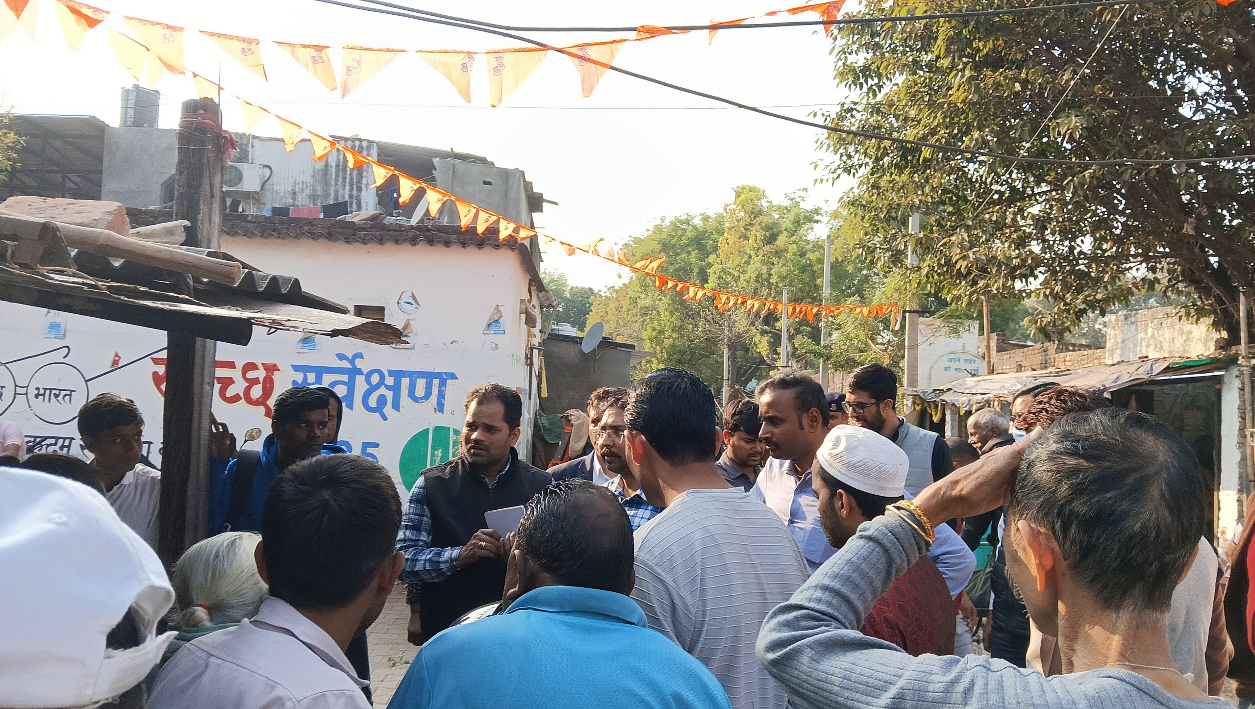 Government officials at Bhai Ram Camp during the enumeration process