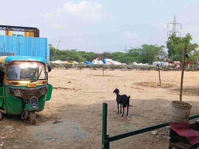 The barren playground at Jai Hind Camp where children come out to play