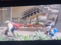 DU professor death: CCTV shows family entering building in face masks, leaving with changed clothes