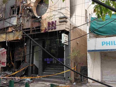 A view of the damaged Flourish Stay hotel days after the devastating fire