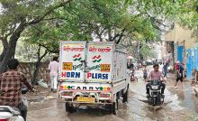Vehicles pass through a waterlogged road in Hargovind Enclave Chhaturpur amid concerns over poor drainage