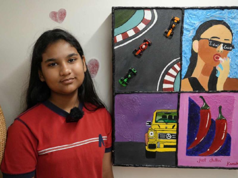 Kanak Sharma, poses with her mixed-media work Inside My Mind