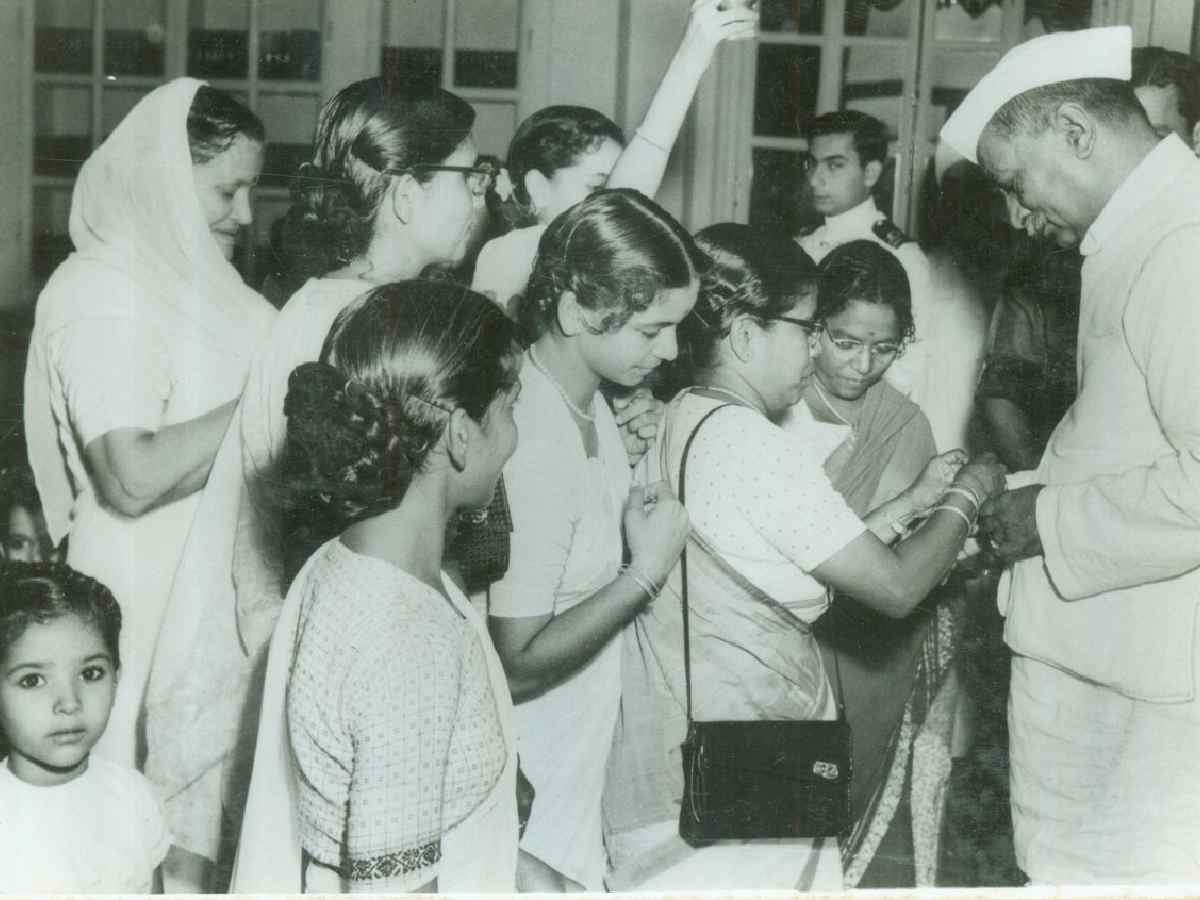 India's first President, Dr Rajendra Prasad, celebrating Raksha Bandhan with women and children at Rashtrapati Bhavan