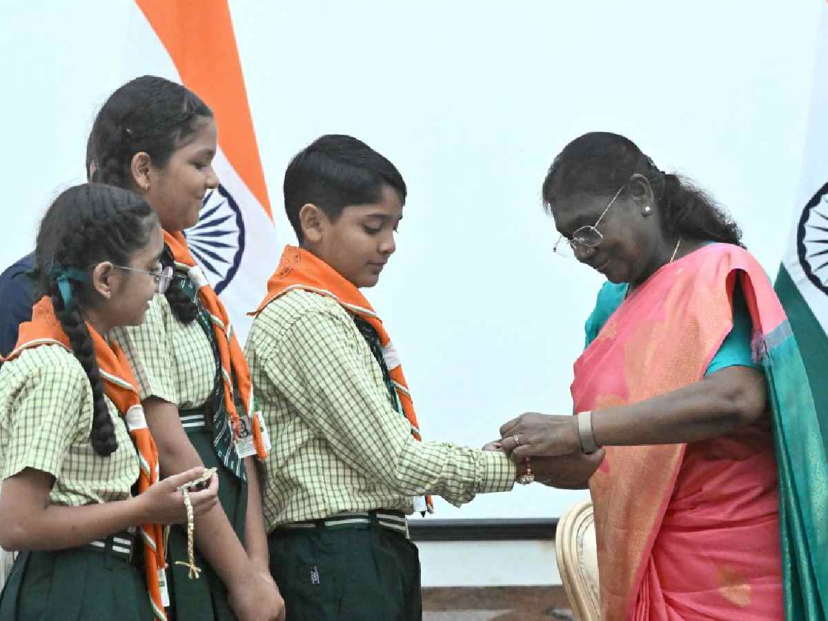 President of India, Droupadi Murmu, celebrating Raksha Bandhan with school children at the Rashtrapati Bhavan