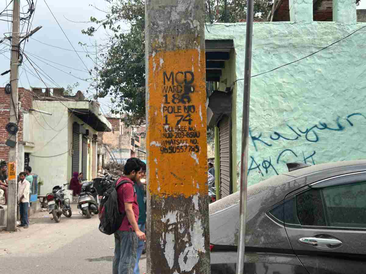 MCD markings on a utility pole prove that the neighbourhood is officially recognised, say residents