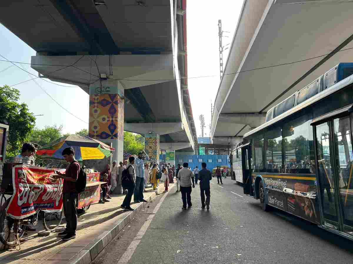 Commuters at the Dhaula Kuan bus stand
