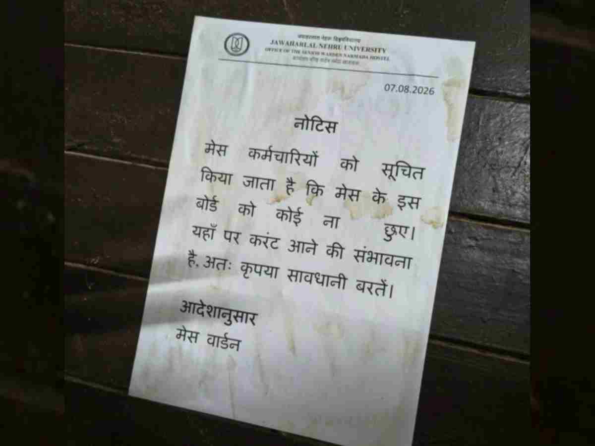 A notice warns mess workers about the possibility of an electrical current in the mess board 